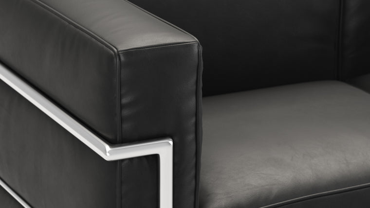 CLOUD LIKE COMFORT | The Grand Modele Two-Person Sofa begs you to make yourself (and a plus one) comfortable in its plump cushions, which gently cradle you and impart an ethereal experience to any living space. Welcome to heaven on earth.
