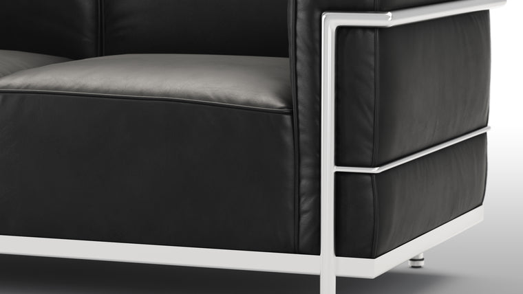 LOW PROFILE | With its back and armrests at the same height, this unique piece creates more visual space and gives you lots of support all at once. Who said clean lines couldn’t be cozy too?
