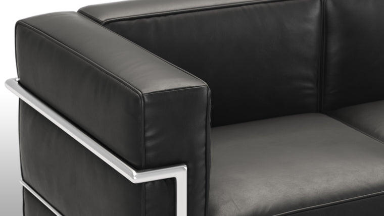 LOW PROFILE | With its back and armrests at the same height, this unique piece creates more visual space and gives you lots of support all at once. Who said clean lines couldn’t be cozy too?
