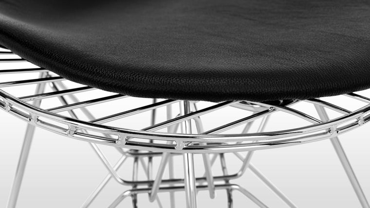 Seating Reshaped | The interplay between the gentle curves and clean lines of this design demarcate the Eiffel Wire Chair as a design classic. Made with care from high-quality materials, this chair was designed with durability in mind, making it a great fuss-free choice for busy homes with kids and pets.
