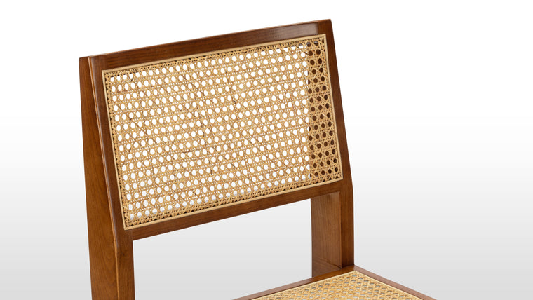 Strong Yet Comfy | A durable wooden frame, complete with angled legs, provides the ideal combination for this chair’s comfortable seat and supportive back. 
