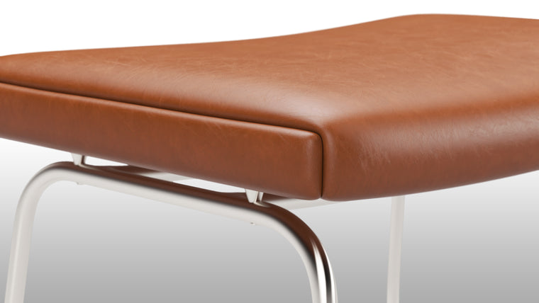 Luxe Materials|The Oslo Ottoman features a sleek and contemporary design that seamlessly complements the Oslo Chair. Crafted with meticulous attention to detail, it boasts exceptional craftsmanship and high-quality materials, ensuring durability and longevity.
