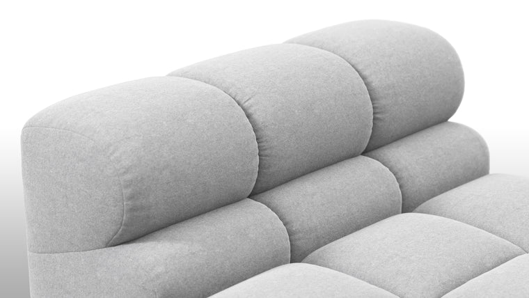 STYLISH SILHOUETTE | Striking the perfect balance between relaxed and refined, the hallmarks of the Tufty are its restrained curves and contours. Equally at home in contemporary and retro settings, this versatile piece will draw the eye and invite you in.
