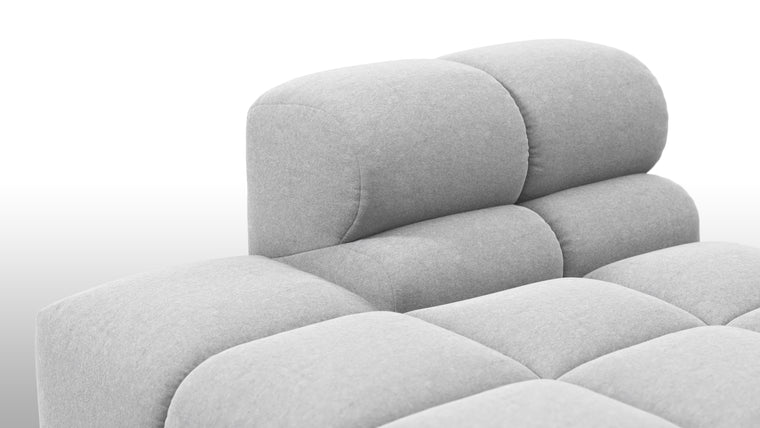 SUPERIOR COMFORT | Designed with the easy-going, informal ethos of the 1970s in mind, the Tufty modules are generously proportioned, coming together in a bench-like base with barely-there connections, allowing plenty of room for you to lean back and curl up in comfort.
