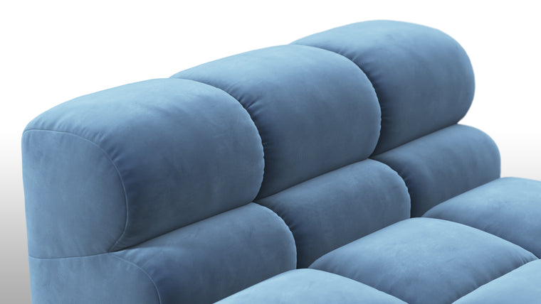 SUPERIOR COMFORT | Designed with the easy-going, informal ethos of the 1970s in mind, the Tufty modules are generously proportioned, coming together in a bench-like base with barely-there connections, allowing plenty of room for you to lean back and curl up in comfort.
