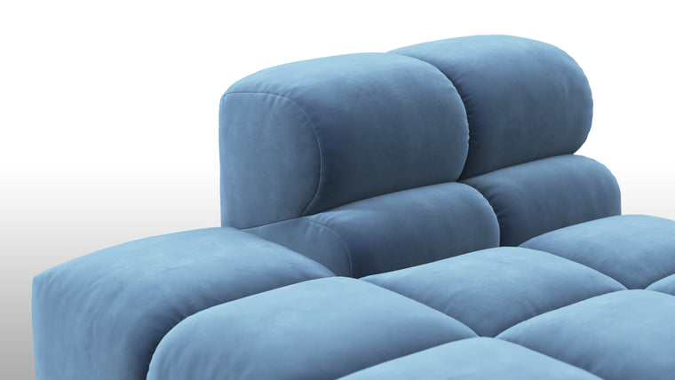 SUPERIOR COMFORT | Designed with the easy-going, informal ethos of the 1970s in mind, the Tufty modules are generously proportioned, coming together in a bench-like base with barely-there connections, allowing plenty of room for you to lean back and curl up in comfort.
