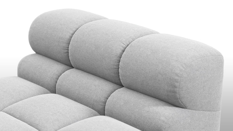 SUPERIOR COMFORT | Designed with the easy-going, informal ethos of the 1970s in mind, the Tufty modules are generously proportioned, coming together in a bench-like base with barely-there connections, allowing plenty of room for you to lean back and curl up in comfort.
