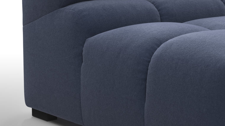 SUPERIOR COMFORT | Designed with the easy-going, informal ethos of the 1970s in mind, the Tufty modules are generously proportioned, coming together in a bench-like base with barely-there connections, allowing plenty of room for you to lean back and curl up in comfort.
