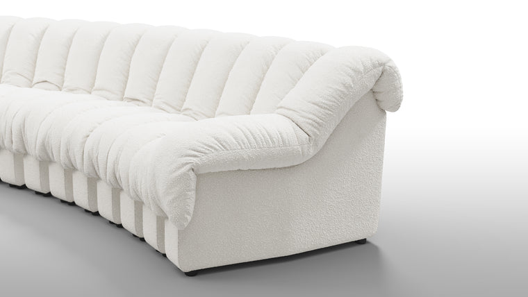 Sculptural Seating | Crafted with uncompromising attention to detail, the DS 600 Sofa showcases exceptional craftsmanship and luxurious materials. The plush upholstery, available in an array of fabrics from premium vegan leather to boucle, envelops you in unparalleled comfort. The elegant stitching and meticulous finishes reflect a dedication to quality and design integrity.
