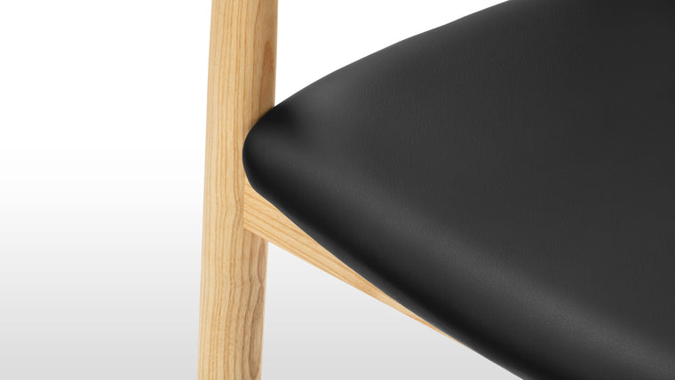 Contoured Comfort | The chair's seat and backrest feature gentle curves to provide ergonomic support, ensuring comfort during extended use. The armrests are designed for a relaxed and natural resting position, enhancing overall comfort.
