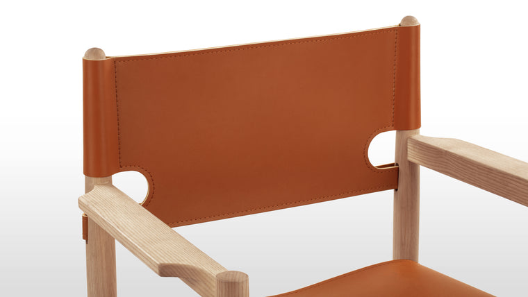 Sophisticated Sling | With its gently curved backrest and contoured sling seat, the Aksel Dining Chair offers exceptional comfort during mealtimes. The carefully chosen vegan leather upholstery adds a touch of luxury and elegance while allowing comfortable sitting and entertaining for hours.
