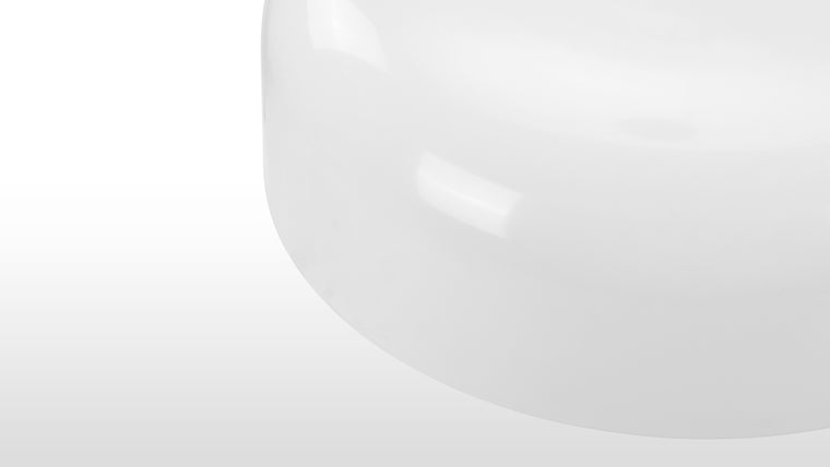 Lightweight Illumination | Crafted with precision, the light features a durable aluminum body. This material not only provides strength but also contributes to the fixture's lightweight nature. The diffuser is made from opalescent polycarbonate, which allows for a soft and evenly dispersed light, creating a warm and inviting atmosphere.

