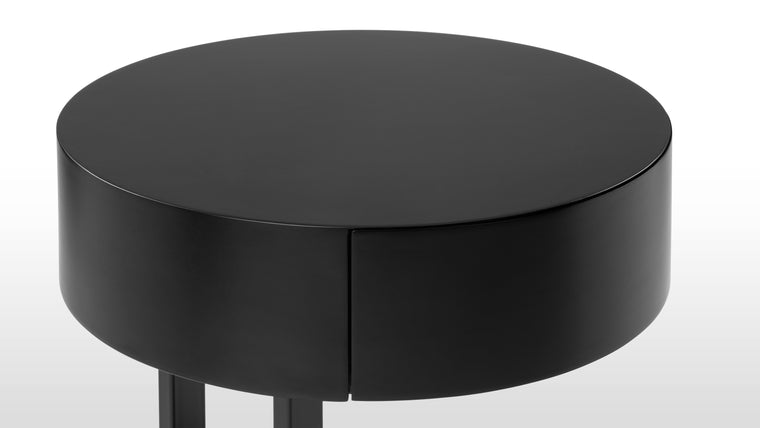 Practicality Meets Style | The single drawer, seamlessly integrated into the tabletop, enhances the table's functionality without compromising its clean lines. This thoughtful addition elevates the practicality of the Rondo Side Table, ensuring that it remains a practical and stylish companion in your modern living space.
