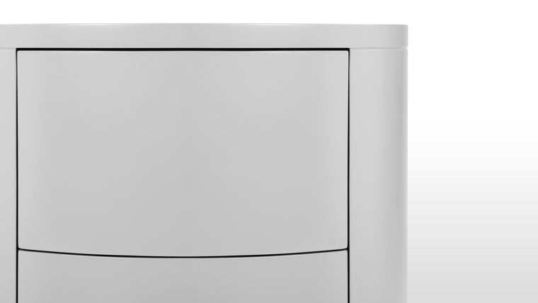 Functional Form | Functionality is at the forefront of the Aire Nightstand's design. Two drawers discreetly incorporated into the rounded frame provide ample storage space for bedside essentials. This practicality does not compromise the nightstand's minimalist charm; instead, it enhances its utility, ensuring that this piece is not just a visual delight but a functional asset.
