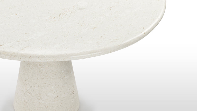 Minimalist Design | The conical pedestal base, constructed with meticulous precision, provides both stability and artistic allure. Its sleek lines and tapered design seamlessly complement the circular tabletop, establishing a harmonious visual balance that exudes modern sophistication.
