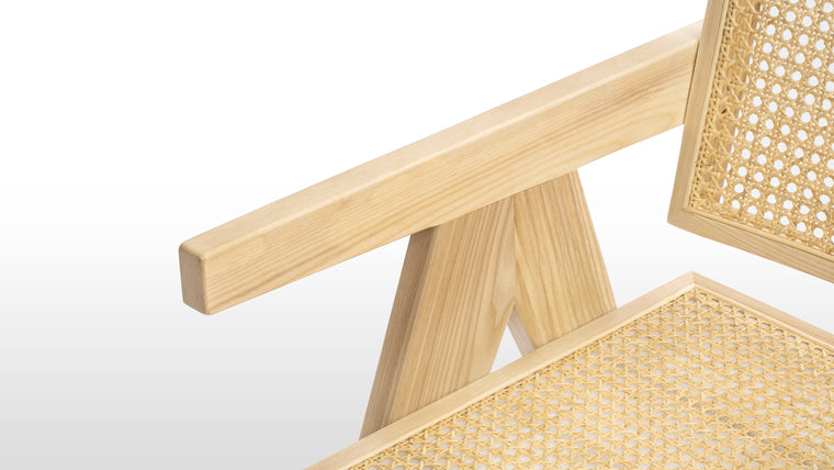 STYLISH SPECIFICS | Proving that beauty is in the details, the Pierre Jeanneret Dining Chair boasts a rattan seat and back that are meticulously handmade by talented artisans.
