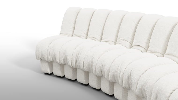 Sculptural Seating | Crafted with uncompromising attention to detail, the DS 600 Sofa showcases exceptional craftsmanship and luxurious materials. The plush upholstery, available in an array of fabrics from premium vegan leather to boucle, envelops you in unparalleled comfort. The elegant stitching and meticulous finishes reflect a dedication to quality and design integrity.
