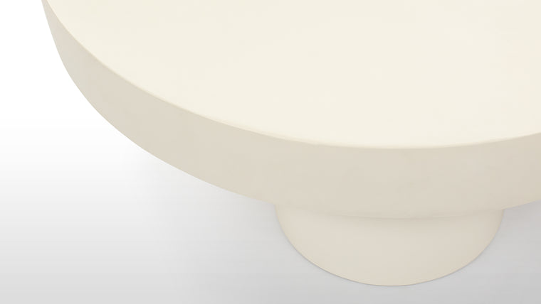 Concrete Canvas | The alabaster concrete, impeccably smooth to the touch, exudes a modern sensibility that seamlessly aligns with the surrounding space. This concrete canvas not only imparts an industrial aesthetic but also ensures that the table remains a testament to enduring design.
