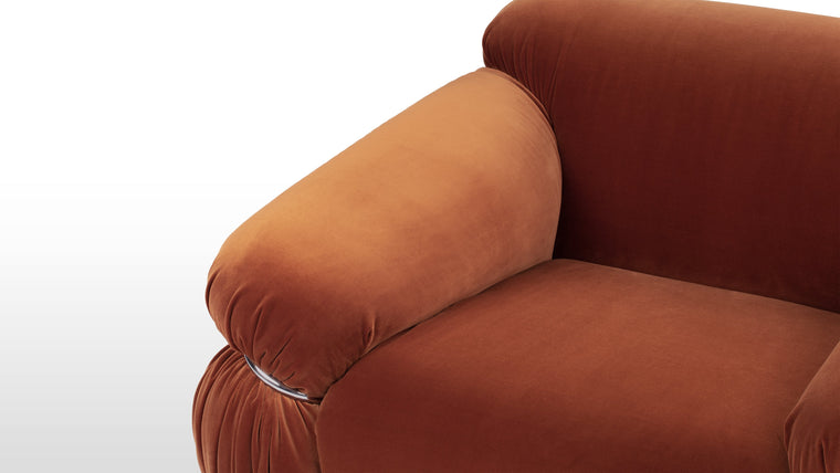 Iconic Appeal | Immerse yourself in the lavish comfort of the Sesann Armchair. Sink into its plush cushions and experience an unparalleled blend of coziness and support. The carefully selected upholstery not only adds a hint of refinement but also beckons you to relish its tactile allure.
