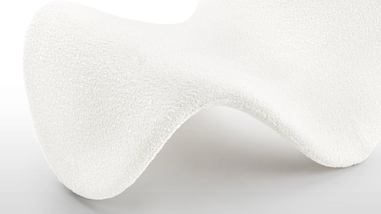 Beautiful Boucle | The luxurious upholstery adds a layer of sophistication, beckoning you to experience the ultimate in relaxation and comfort, whether you are unwinding after a long day or seeking a cozy corner for contemplation.
