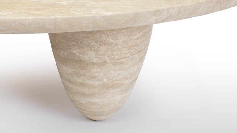 Elegance from top to bottom | The travertine legs, with their sleek profile and refined finish, complement the tabletop perfectly, creating a cohesive and harmonious look.
