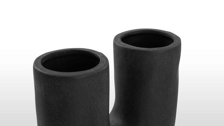 Organic & Subtle | The soft, organic forms of the Daan Vase encourage contemplation, gently catching the eye wherever its positioned - whether arranged on a table, console or bookcase.
