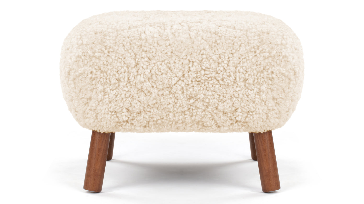 A PETITE COMPANION | Designed to complement the Petra Lounge Chair, the Petra Ottoman adds comfort and style to the cosy yet sophisticated chair. Not to be overshadowed by its predecessor, the stool is quite lovely and versatile on its own. It can be utilized as a traditional footstool or ottoman, and it’s also ideal for extra seating.
