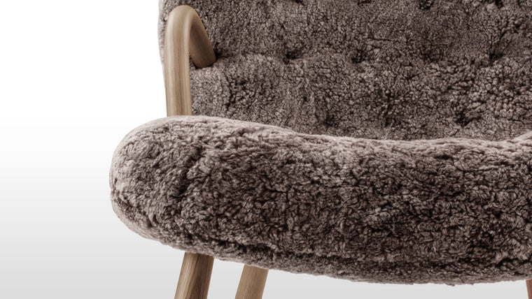 FRIENDLY FORM | Small in stature but big in terms of personality, the Clam chair is a seat that calls to you from across the room. The gentle curves of the backrest, bentwood arms, and rounded legs give this chair a friendly and inviting appearance that promises to wrap you up in hygge.
