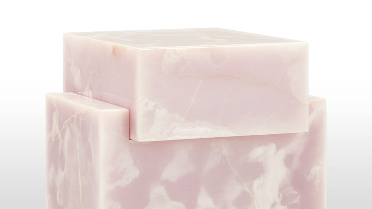 A Symbol of Style | The Fliss Pink Onyx Side Table isn't just a piece of furniture; it's a conversation starter, a focal point that commands attention and admiration. Its presence in your living space not only adds a touch of luxury but also serves as a  testament to enduring style and beauty.
