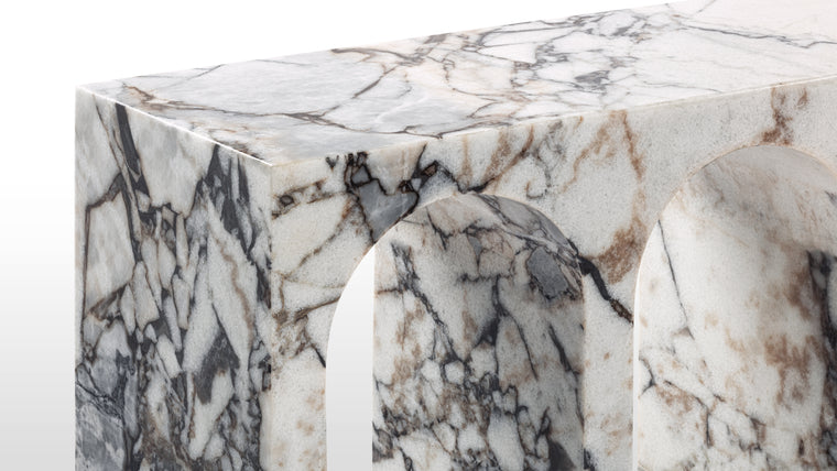 Classical Inspiration | The defining feature of the Venice Console Table is its intricately designed base, inspired by the grandeur of Roman arches. These arches, iconic for their rounded, semi-circular shape, have been integral to Roman architecture, symbolizing strength and beauty.
