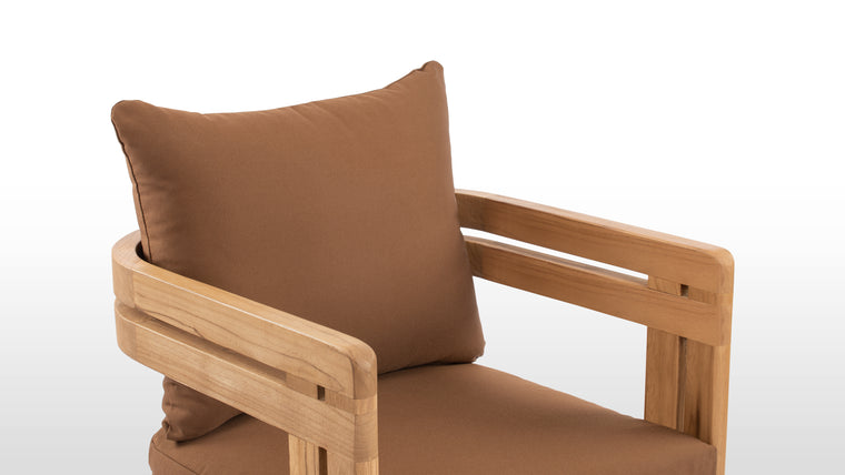 Beautifully Resilient | Enhanced with high-performance outdoor fabric cushions, the Lusso Outdoor Dining Chair ensures luxurious comfort without compromising on durability.
