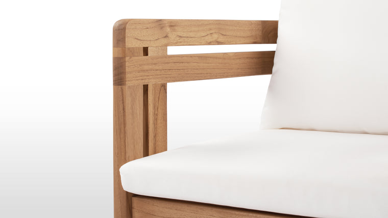 Beautifully Resilient | Enhanced with high-performance outdoor fabric cushions, the Lusso Outdoor Dining Chair ensures luxurious comfort without compromising on durability.
