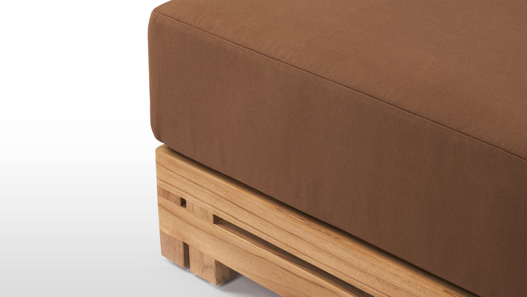 Beautifully Resilient | Enhanced with high-performance outdoor fabric cushions, the Lusso Outdoor Ottoman ensures luxurious comfort without compromising on durability.
