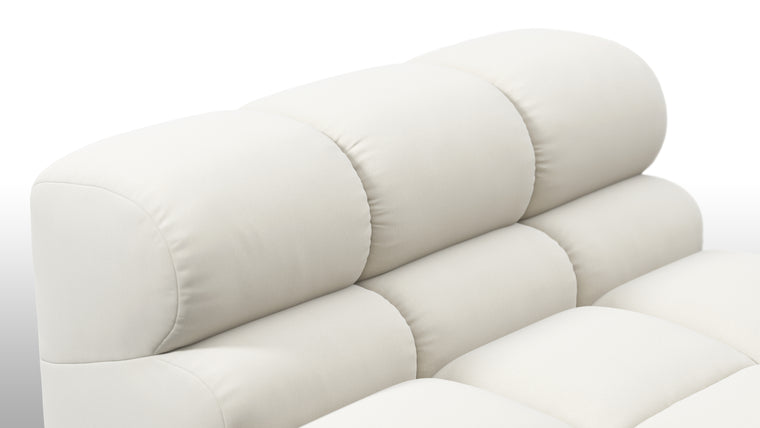 SUPERIOR COMFORT | Designed with the easy-going, informal ethos of the 1970s in mind, the Tufty modules are generously proportioned, coming together in a bench-like base with barely-there connections, allowing plenty of room for you to lean back and curl up in comfort.
