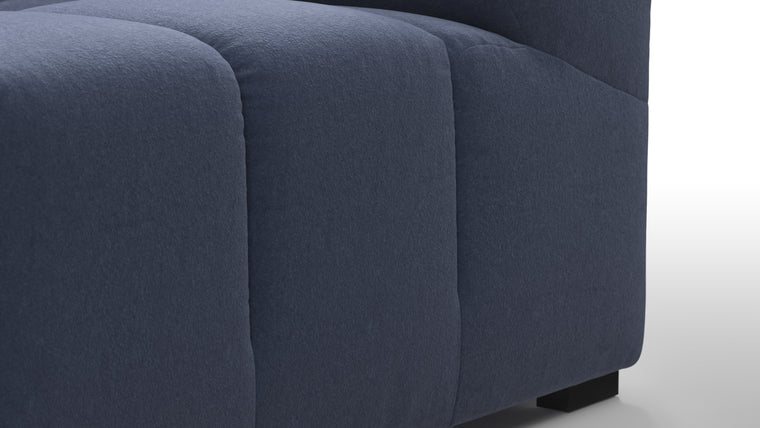 SUPERIOR COMFORT | Designed with the easy-going, informal ethos of the 1970s in mind, the Tufty modules are generously proportioned, coming together in a bench-like base with barely-there connections, allowing plenty of room for you to lean back and curl up in comfort.
