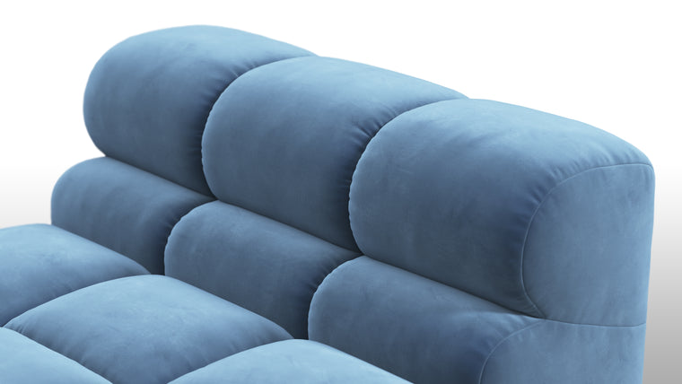 SUPERIOR COMFORT | Designed with the easy-going, informal ethos of the 1970s in mind, the Tufty modules are generously proportioned, coming together in a bench-like base with barely-there connections, allowing plenty of room for you to lean back and curl up in comfort.
