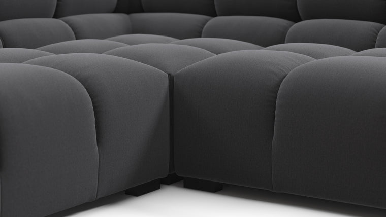 SUPERIOR COMFORT | Designed with the easy-going, informal ethos of the 1970s in mind, the Tufty modules are generously proportioned, coming together in a bench-like base with barely-there connections, allowing plenty of room for you to lean back and curl up in comfort.
