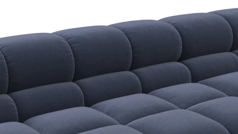 SUPERIOR COMFORT | Designed with the easy-going, informal ethos of the 1970s in mind, the Tufty modules are generously proportioned, coming together in a bench-like base with barely-there connections, allowing plenty of room for you to lean back and curl up in comfort.
