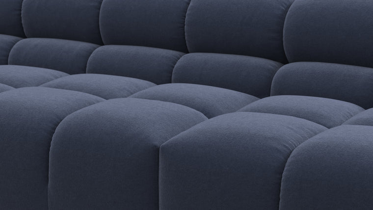 STYLISH SILHOUETTE | Striking the perfect balance between relaxed and refined, the hallmarks of the Tufty are its restrained curves and contours. Equally at home in contemporary and retro settings, this versatile piece will draw the eye and invite you in.
