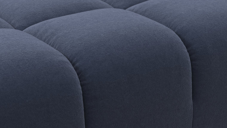 SUPERIOR COMFORT | Designed with the easy-going, informal ethos of the 1970s in mind, the Tufty modules are generously proportioned, coming together in a bench-like base with barely-there connections, allowing plenty of room for you to lean back and curl up in comfort.
