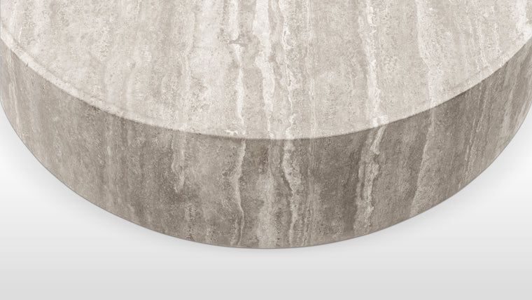 Strong Form | Designed for practicality and style, the Toren Coffee Table’s recessed surface and sturdy pillar design provide a durable and visually appealing centerpiece.
