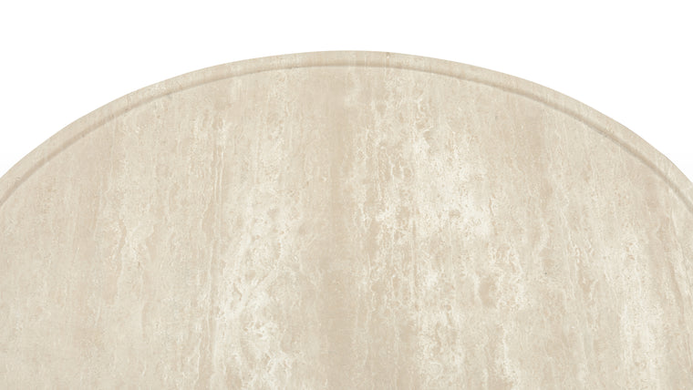 Variation in Veins | The table's travertine surface displays unique, cloud-like veining patterns in warm or cool tones, with a honed finish that exudes understated elegance.
