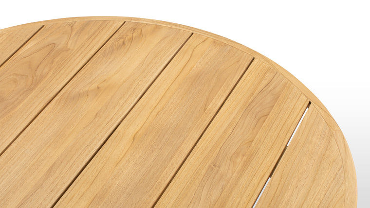 Outdoor Essential | Perfectly sized for four to six guests, this table is designed for outdoor use, naturally resisting moisture, and decay. Whether on a patio or in a garden, it remains a stylish and functional focal point.
