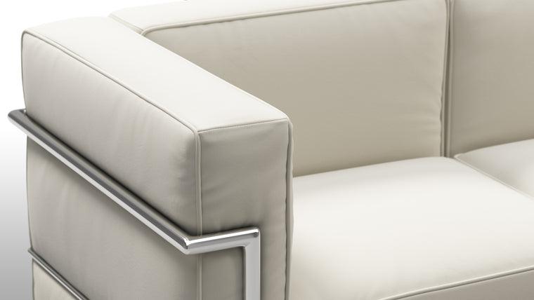 Cloud like comfort | The Grand Modele Three-Person Sofa begs you to make yourself (and a couple friends) comfortable in its plump cushions, which gently cradle you and impart an ethereal experience to any living space. Welcome to heaven on earth.
