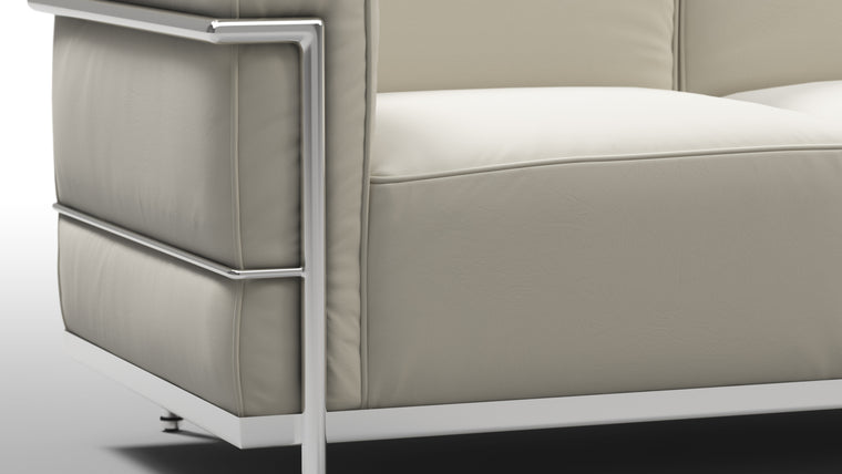 Cloud like comfort | The Grand Modele Two-Person Sofa begs you to make yourself (and a plus one) comfortable in its plump cushions, which gently cradle you and impart an ethereal experience to any living space. Welcome to heaven on earth.
