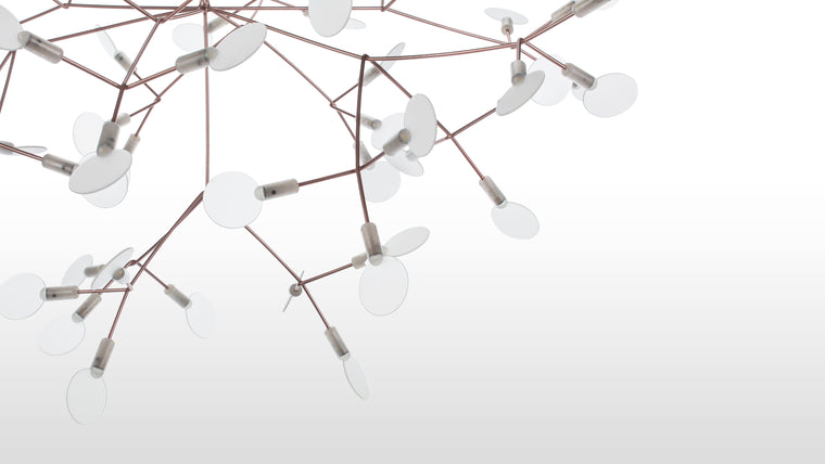 Nature’s Glow | More than just a chandelier, this piece serves as a luminous art installation, casting a warm, inviting radiance while enhancing the aesthetic of contemporary luxury interiors.
