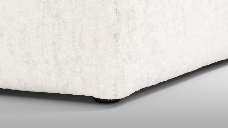 Redefining Relaxation | The cushioning of the sofa provides a unique seating experience that combines softness with support, ensuring that the sofa remains comfortable for extended periods. The sofa’s low profile and generous dimensions encourage a laid-back lounging posture, making it perfect for both casual and formal settings.
