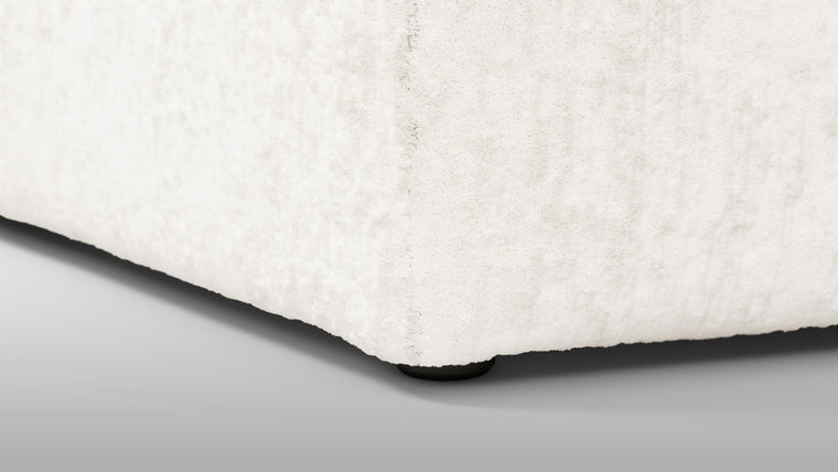 Redefining Relaxation | The cushioning of the sofa provides a unique seating experience that combines softness with support, ensuring that the sofa remains comfortable for extended periods. The sofa’s low profile and generous dimensions encourage a laid-back lounging posture, making it perfect for both casual and formal settings.
