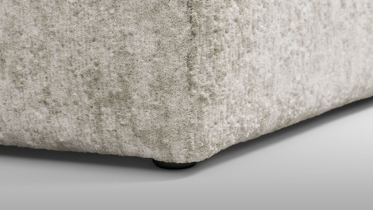 Redefining Relaxation | The cushioning of the sofa provides a unique seating experience that combines softness with support, ensuring that the sofa remains comfortable for extended periods. The sofa’s low profile and generous dimensions encourage a laid-back lounging posture, making it perfect for both casual and formal settings.
