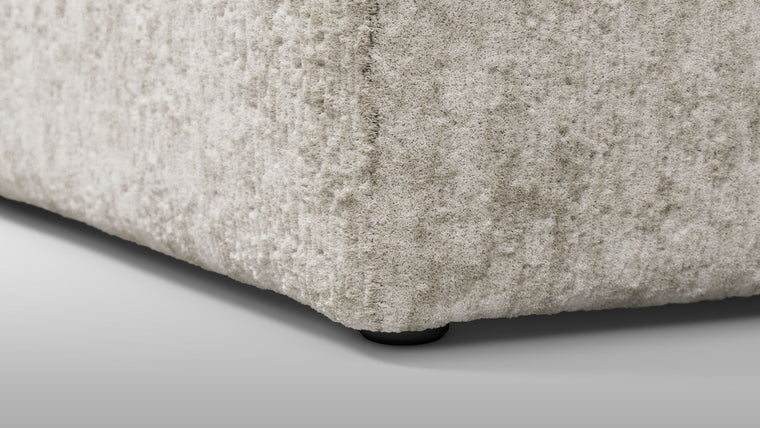 Redefining Relaxation | The cushioning of the sofa provides a unique seating experience that combines softness with support, ensuring that the sofa remains comfortable for extended periods. The sofa’s low profile and generous dimensions encourage a laid-back lounging posture, making it perfect for both casual and formal settings.
